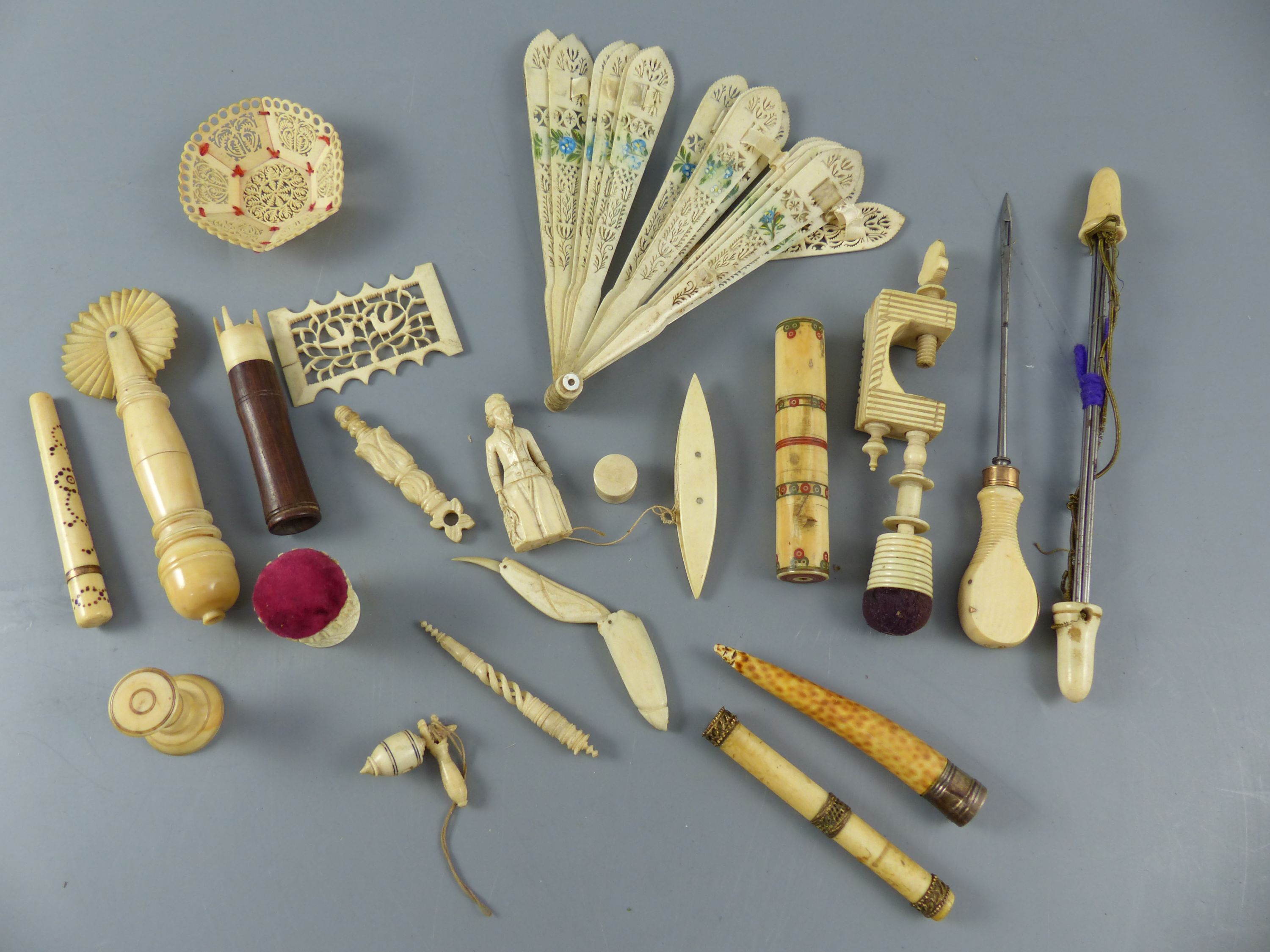 A group of assorted 19th century ivory sewing implements and objets dart
